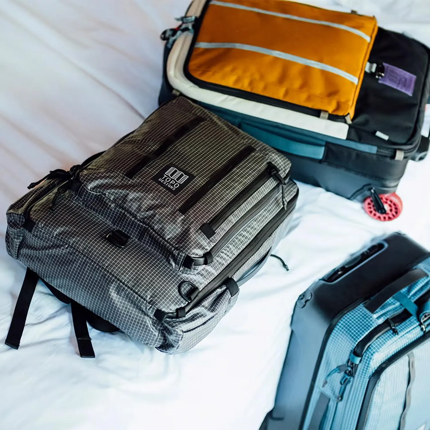 Topo Designs Global Travel Bag 30-40 Liter - Carry-on Compliant Versatile Pack, 3 Carry Options, External Laptop Sleeve (Eco-Friendly, 30L, Apex Pond Blue)